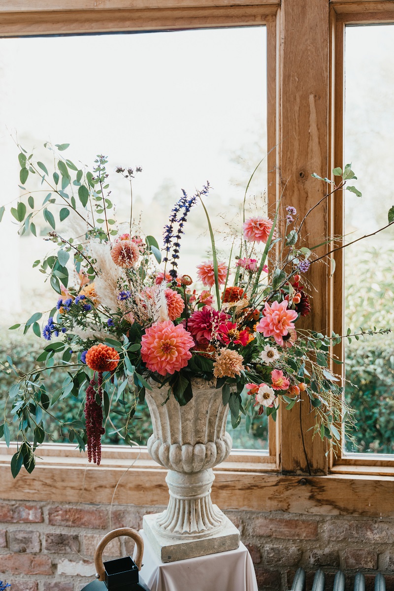 Ceremony Set Up at Barns & Yard. Florals by Bride and Bloom using Roses and other seasonal British flowers.